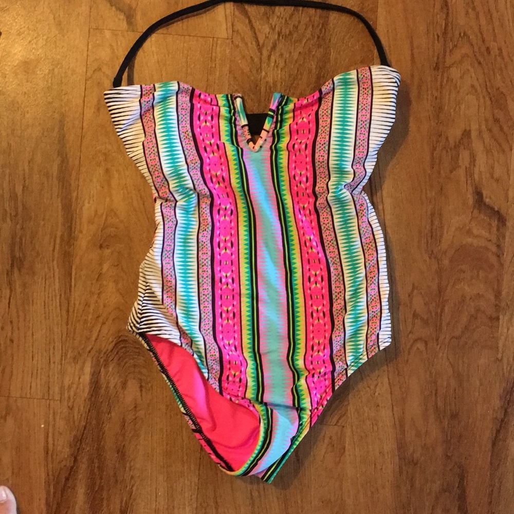 New One Piece Plunging Neck swimsuit. Wore once.